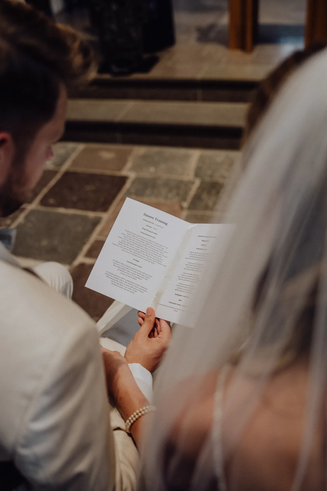 Das Programmheft der kirchlichen Trauung – Hochzeit Anna & Joost, Romantik Hotel Fuchsbau, Timmendorfer Strand